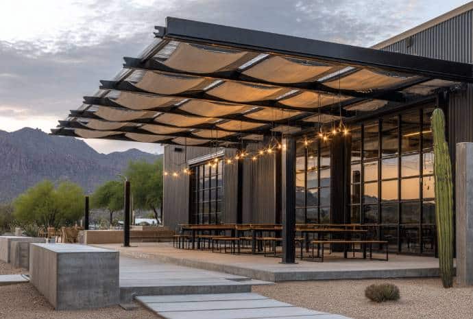Modern outdoor dining area with lights