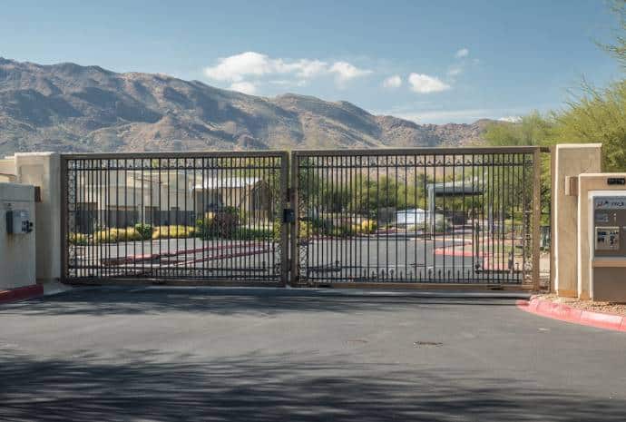 Closed gate with mountain backdrop