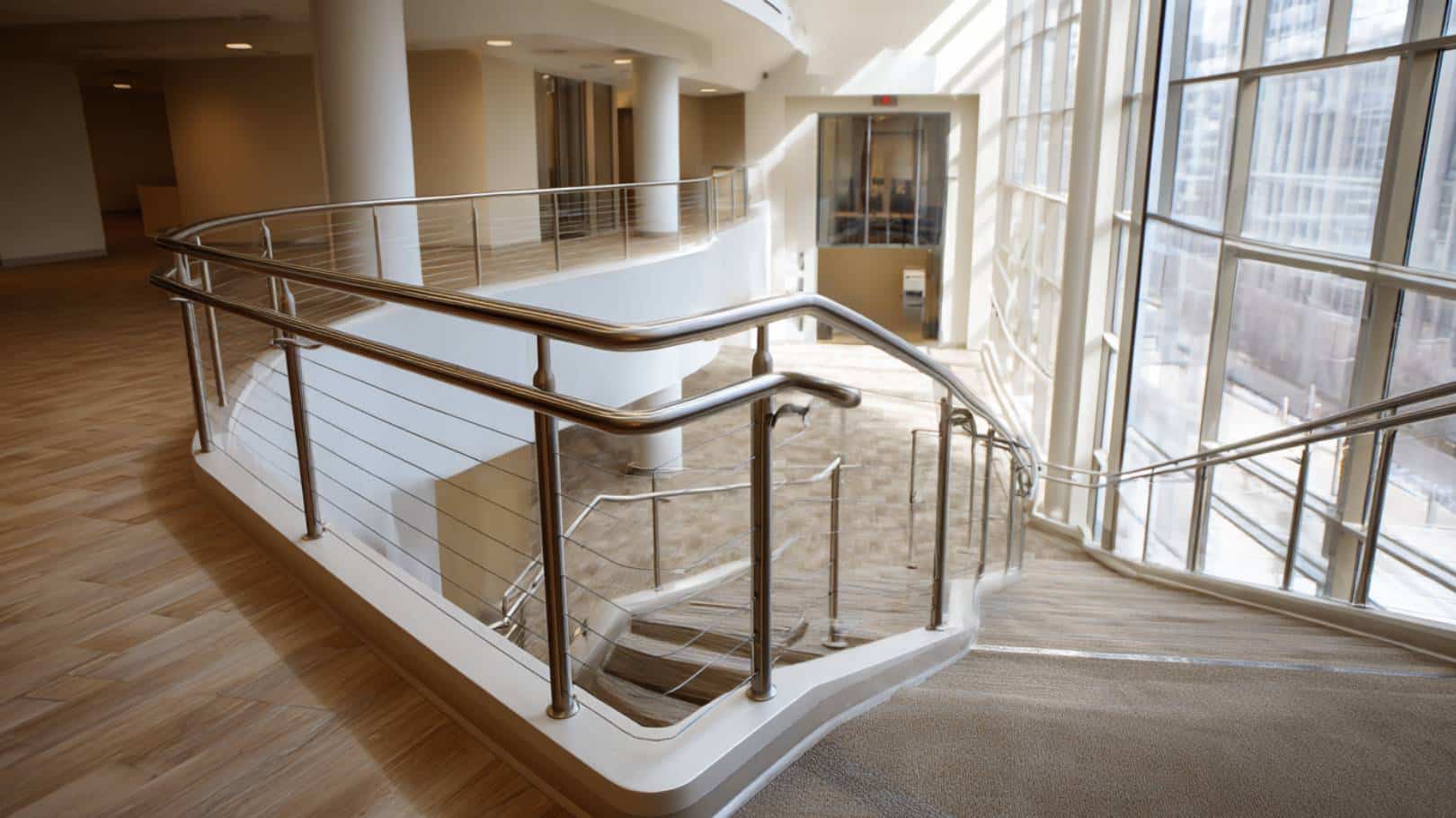 handrail-main Modern staircase with sleek handrail.