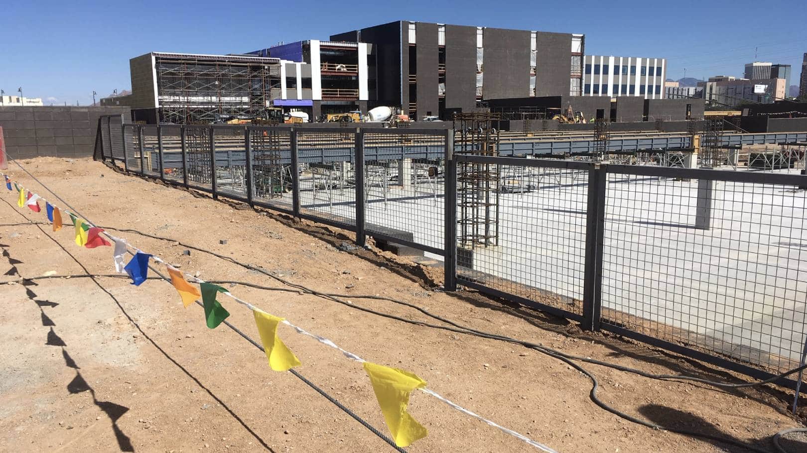 Construction site with colorful flags