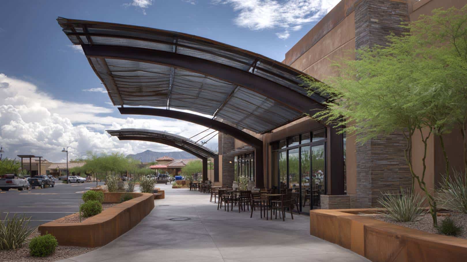 Modern building with curved awnings.